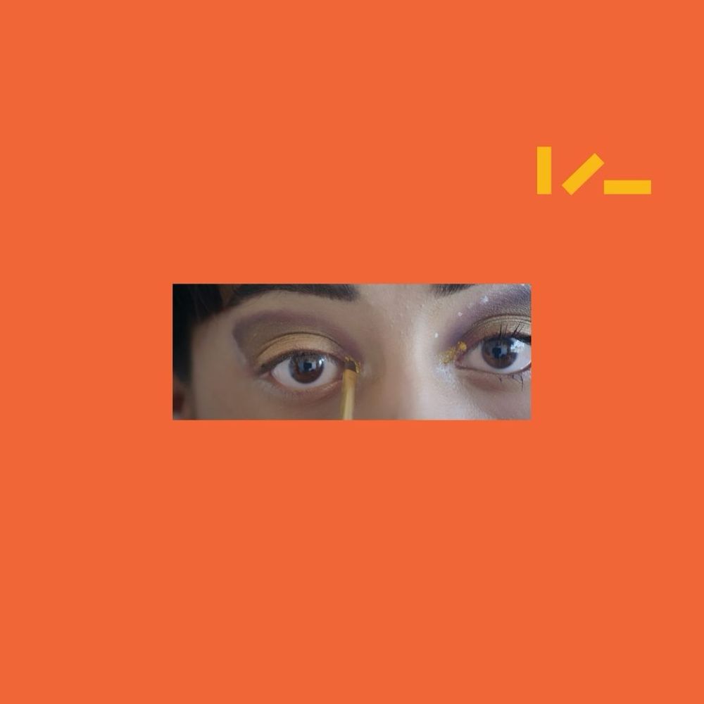 A still image of eyes and the Take One Action logo. 