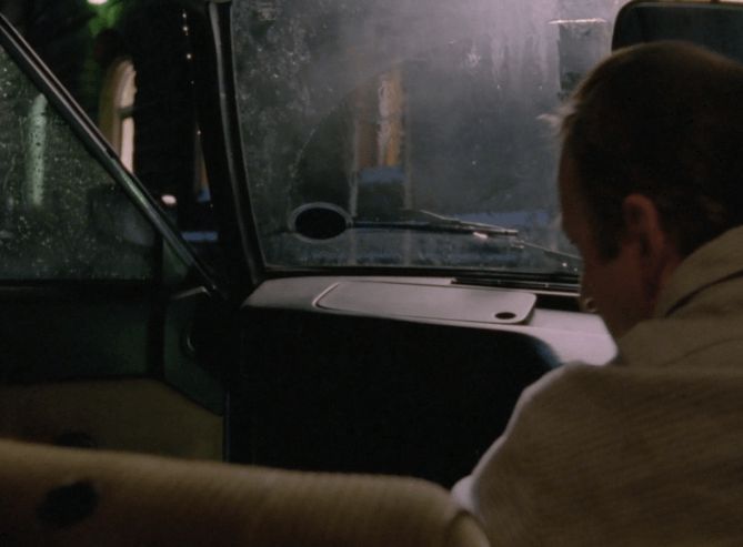 ChatGPT describes the image as "The image depicts a man seated in the front passenger seat of an older vehicle, possibly a van or a truck, with an interior that appears worn and utilitarian. He is turned slightly to the side, facing the windshield, which shows signs of dirt and rain, suggesting recent or ongoing bad weather. The scene occurs during the daytime, but the lighting is dim, hinting at a somber or tense atmosphere. The background outside the vehicle is indistinct, implying a secluded or quiet rural or industrial setting. The overall mood hints at introspection or contemplation amidst a serious or suspenseful context."

BotOfDarkness, version 2.0.23. AWS Lambda version: 1.14.