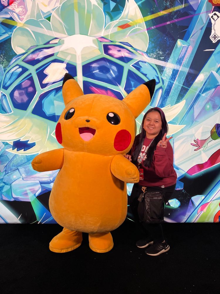 Lazyregenesis posing with the Pikachu mascot of Pokémon