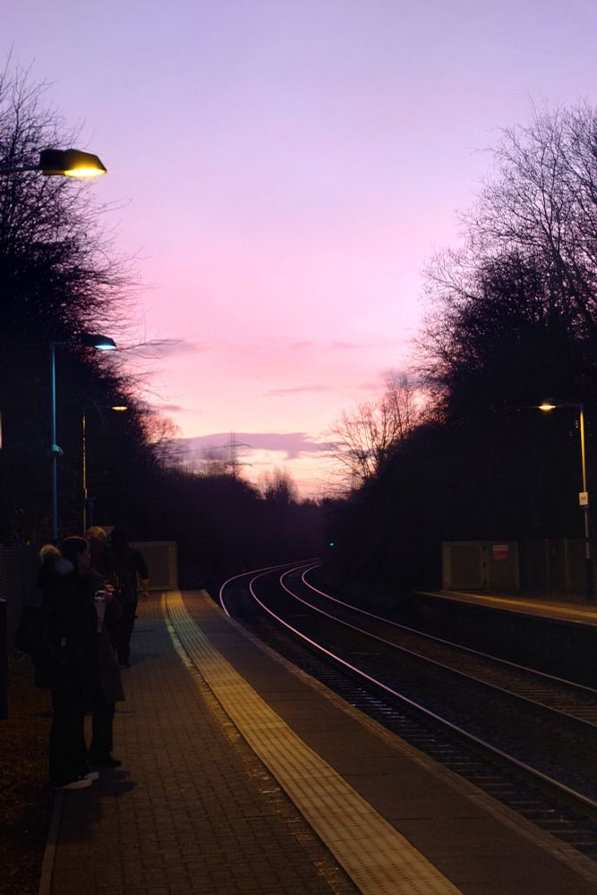 Pink sunrise at a station 