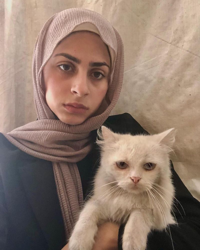 Both Aseel and the cat looking much much thinner 