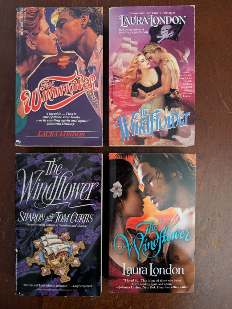 Four mass market paperback copies for The Windflower by Laura London, a.k.a. Sharon and Tom Curtis, arranged in a 2x2 grid. Each copy has a different cover; two of them feature closeups of a man and a woman about to kiss, one shows a half-naked man grasping a bosomy woman just under her bazooms, and one features zero people, just an elaborate enameled brooch of a three-masted ship on a dark brocade background.