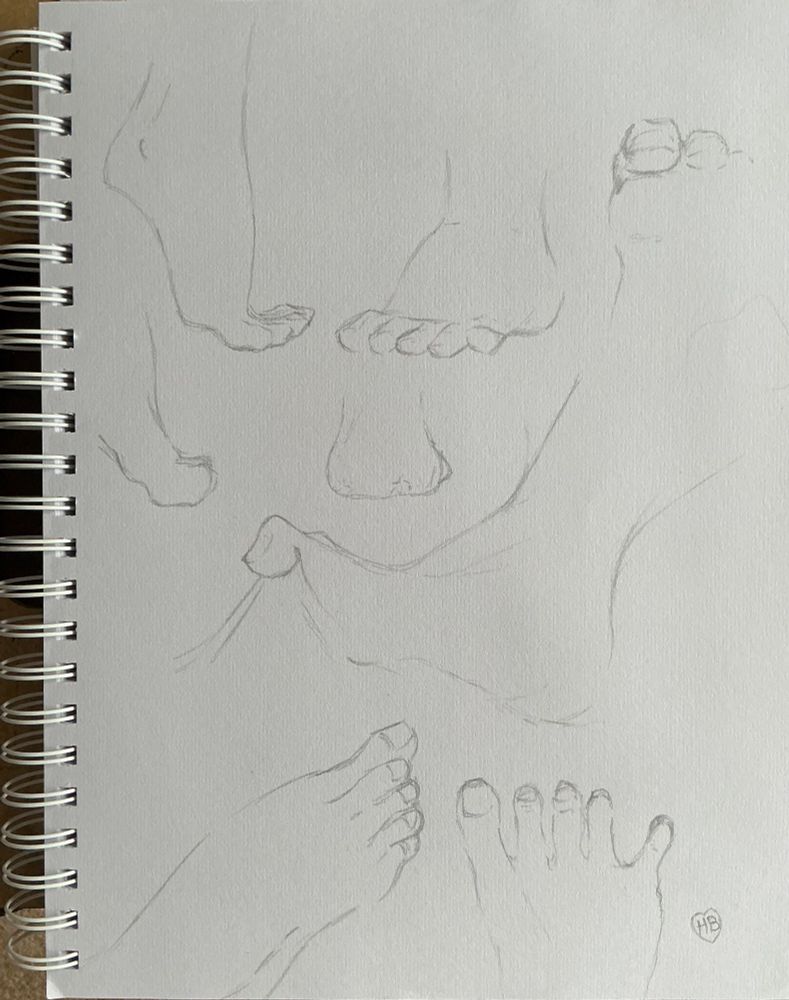 My sketchbook with some drawings I did of feet