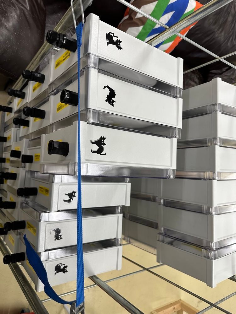 Waterproof boxes for the wifi access points with pixelated cats on them.