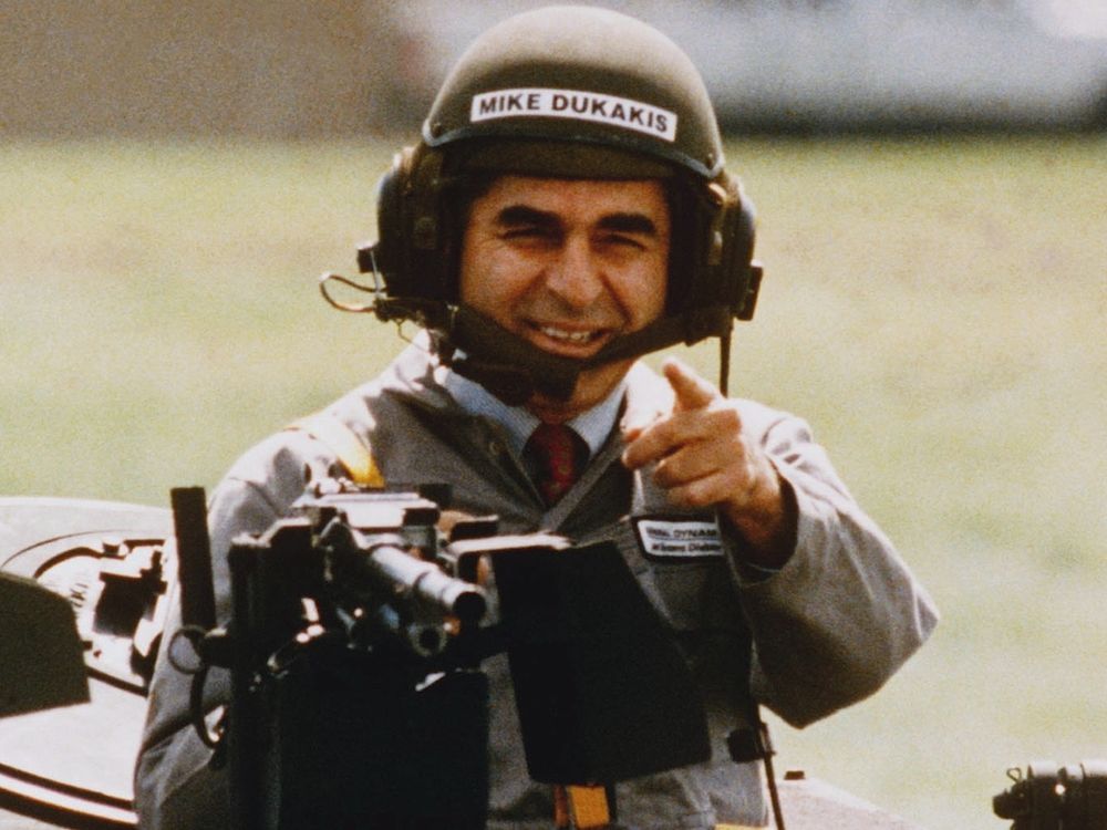 Michael Dukakis riding in tank