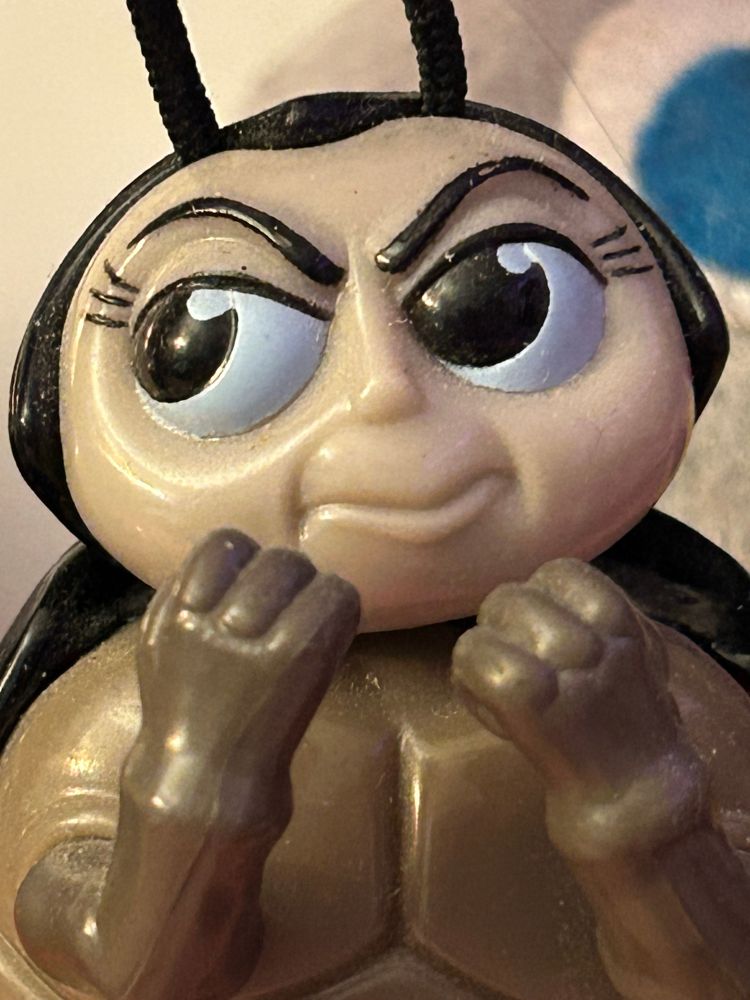 a toy i have of the ladybug from A Bug’s Life, putting up his dukes 
