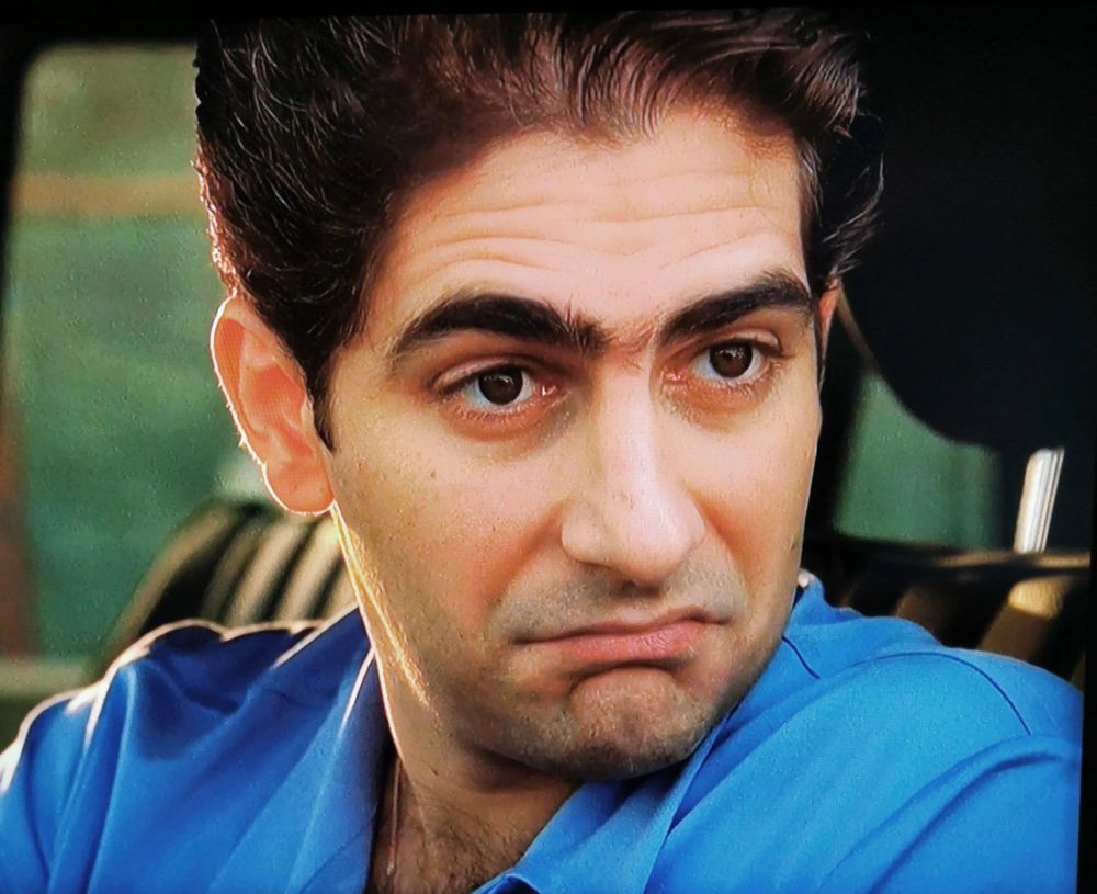 Man nods approvingly 