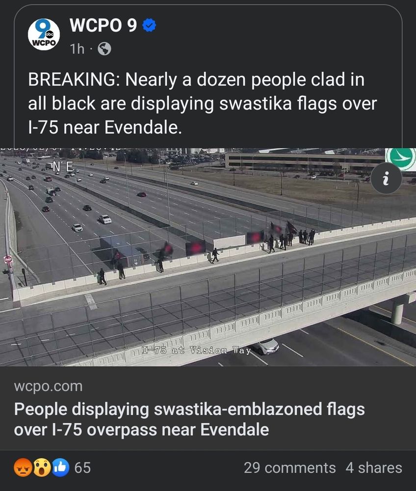 News station WCPO 9 reports: "BREAKING: Nearly a dozen people clad in all black are displaying swastika flags over I-75 near Evendale." There is an accompanying image of the overpass with the Nazis displaying the flags.

Even when emboldened, Nazis are merely a gaggle of cowards. 