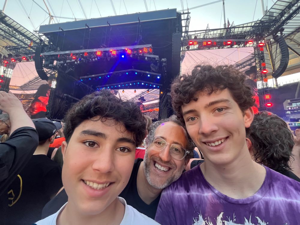 Kirk and kids at Bruce Springsteen concert.