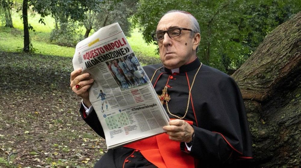A Cardinal reading a newspaper about Napoli 