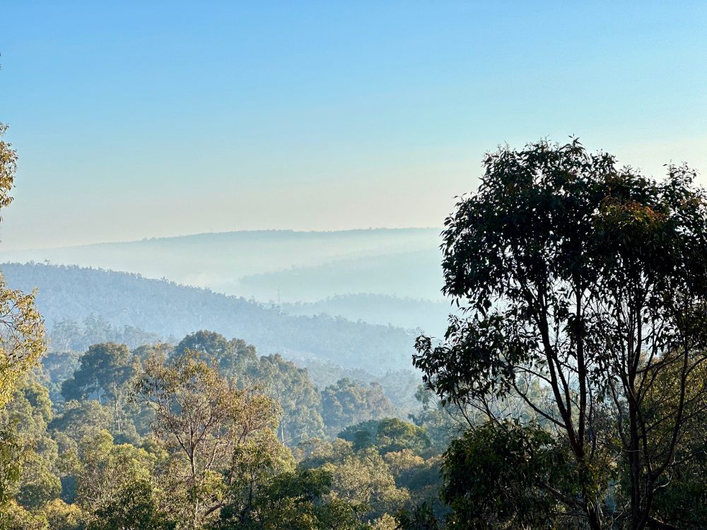 View over Kalamunda National Park showing a very smoky haze