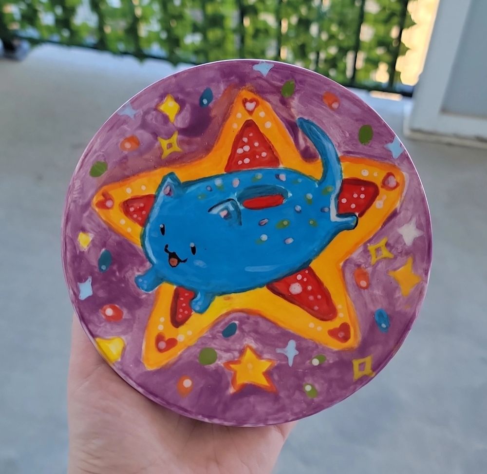 Picture of painted plate of my character cat donut