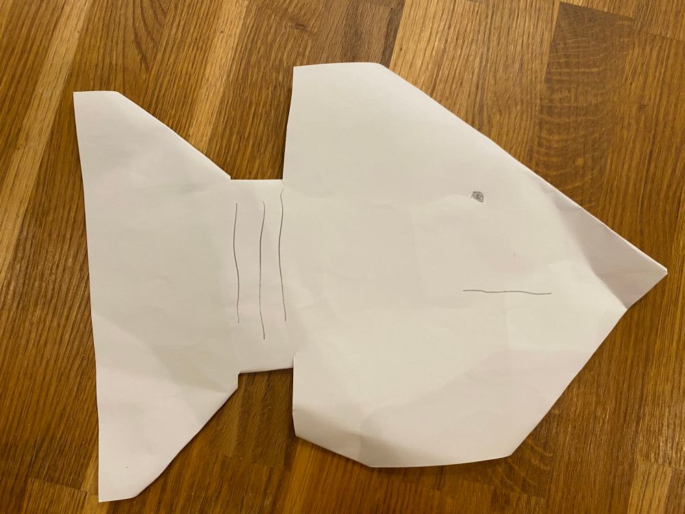 A paper design. At this angle it looks like a fish. It has hills and a mouth