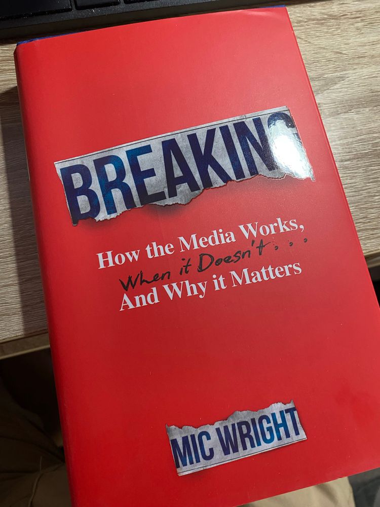 The red cover of a book titled 
Breaking
how the Media works,
When it doesn’t
And why it matters 

It’s written by Mic Wright