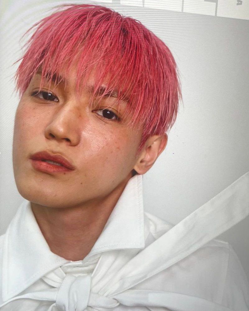 taeyong from nct with bleached pink hair