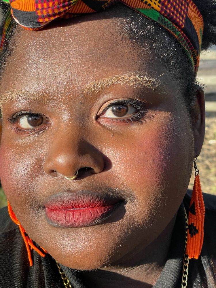 a close up of joy looking directly at the camera