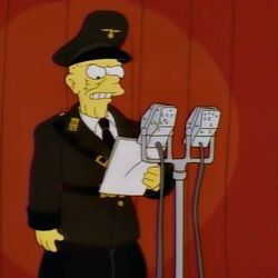 Simpsons character dressed like a Nazi announces “Up Late with McBain”