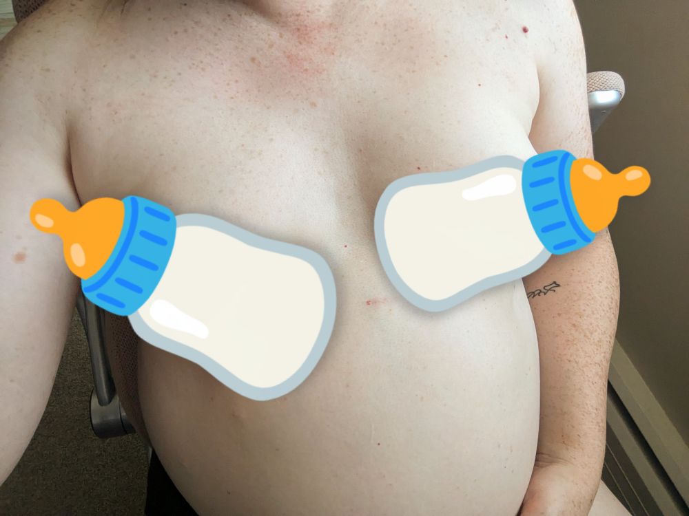 Selfie of Maggie's torso. She's nude other than two milk bottle emojis covering her nipples. Her dome of a belly juts out of frame