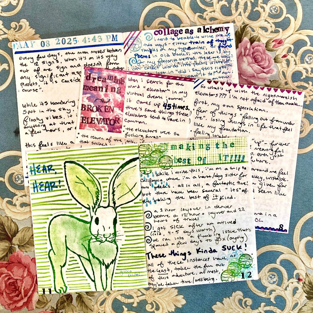 a stack of 3 zines, each open showing part of the inside of the zine. on top are pages 11 and 12, showing a print of a big eared rabbit and the essay "making the best of IT!!!", both in green. below that it's open to the essay "dreaming meaning: broken elevators" which is stamped over a picture of pink clouds with pink and purple handwriting. the bottom zine is open to the intro page, as well as the essay "collage as alchemy", a mix of pink and blue text. 