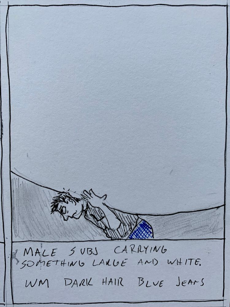 MALE SUBJ CARRYING
SOMETHING LARGE AND WHITE.
WM DARK HAIR BLUE JEANS