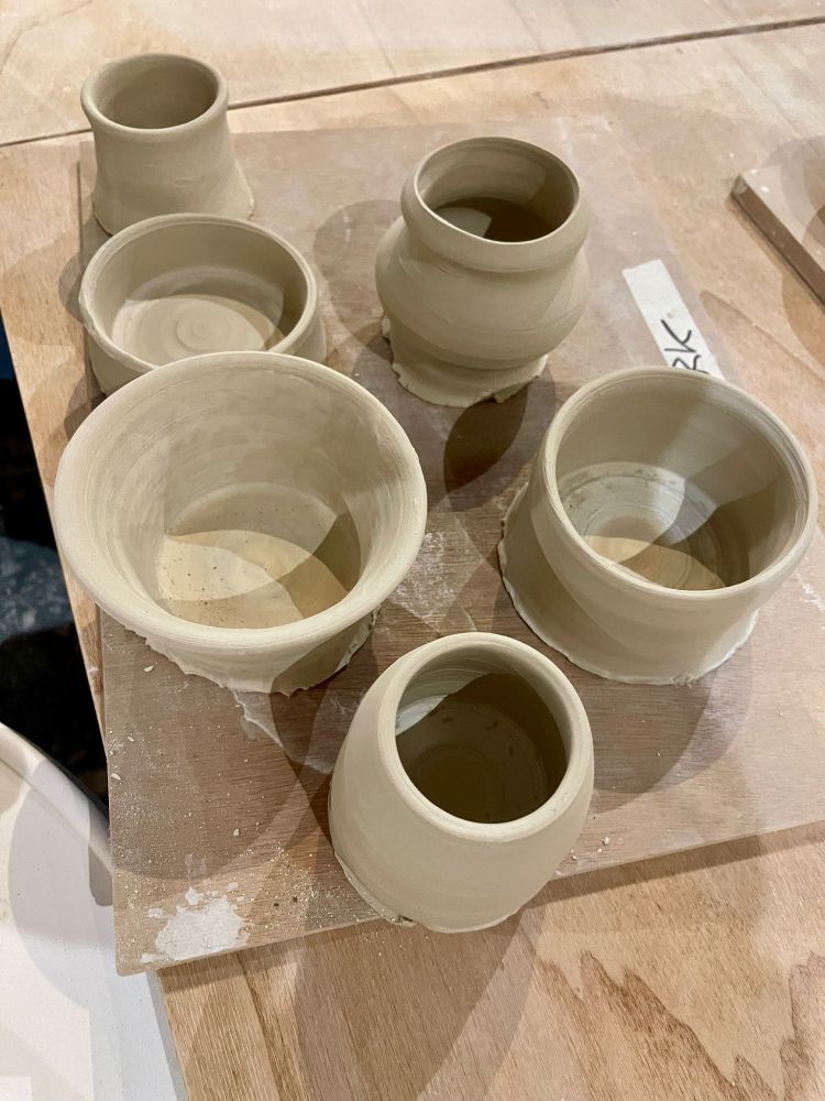 6 beginner-level thrown clay pots, prior to trimming