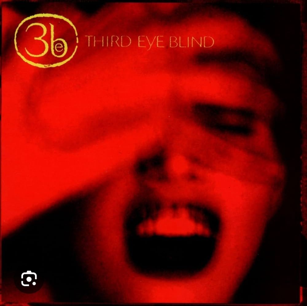 Cover art for Third Eye Blind's debut self-titled album depicting a blurry woman, mouth open, with hands obscuring her right eye. She wears dark lipstick and heavy eyeliner. The photo looks as if it was taken on a Polaroid.