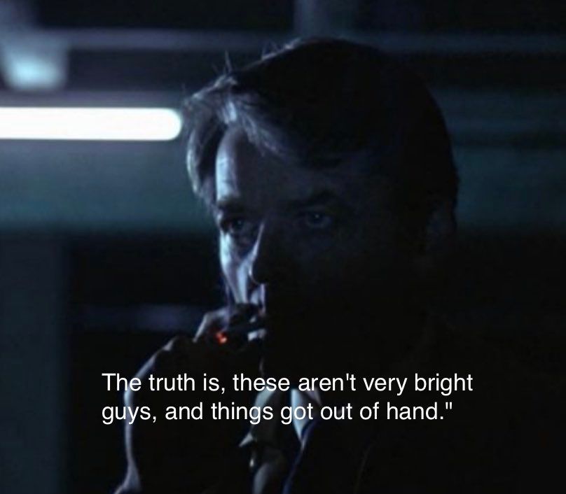 Screenshot of All The President’s Men, of “Deep Throat” (Hal Holbrook) smoking a cigarette in a dark parking lot with the subtitles “The truth is, these aren't very bright guys, and things got out of hand."