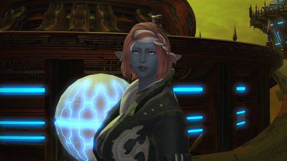 Tali with the Guidance Node behind her. She looks sad.