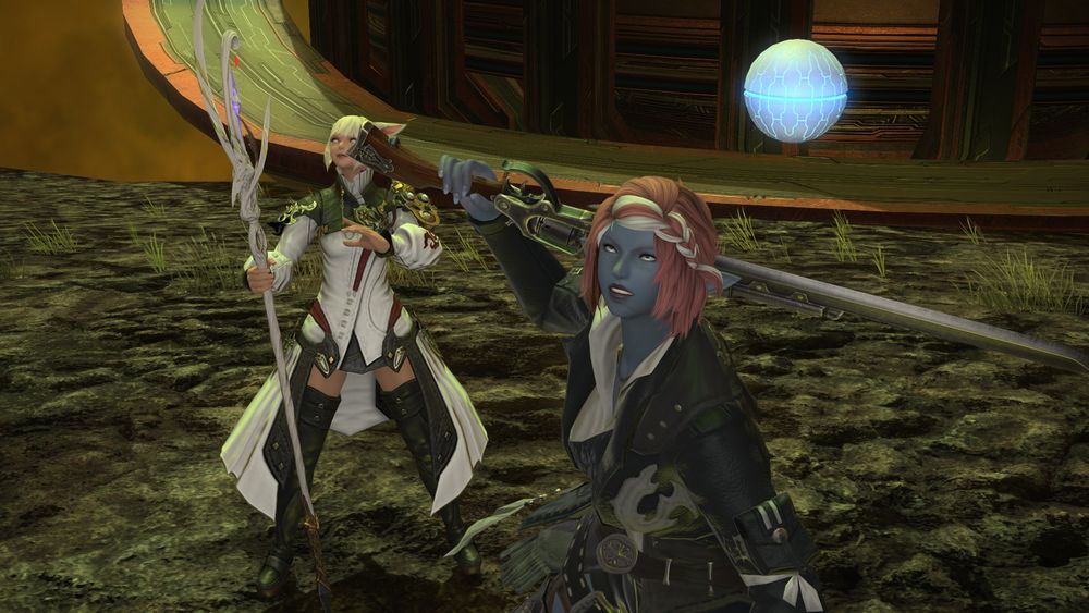 Tali with a gun. She's angry. Y'shtola is beside her.