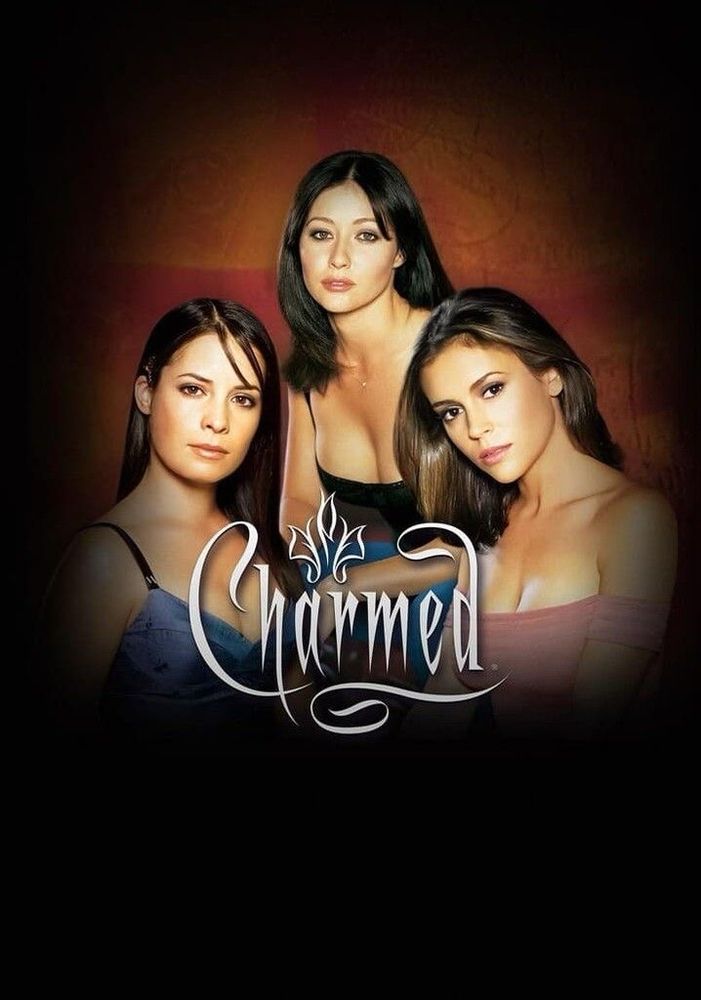 Charmed Series poster. Three women stand together, one in the middle crouching higher above them. from left to right:
Piper (a woman with long straight brunette hair, with a few strings swooping across her face. she is wearing what appears as a blue spaghetti-dress or push-up top.)
Prue (a woman with shoulder-length black hair, wearing what appears to be a black spaghetti-strap tank top, with her left arm covering whatever blue-colored bottoms she’s wearing.)
Phoebe (a woman with shoulder-length brunette hair, swooped over her right shoulder. she is wearing a peachy-pink colored off-the-shoulder top.)
