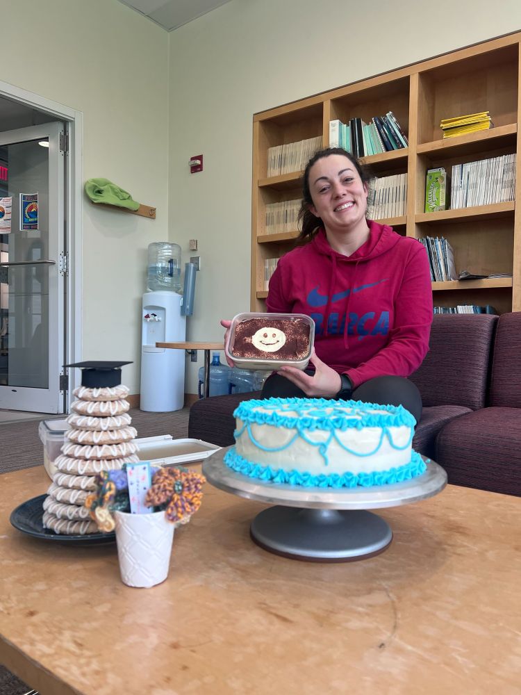 Smiling woman with cake