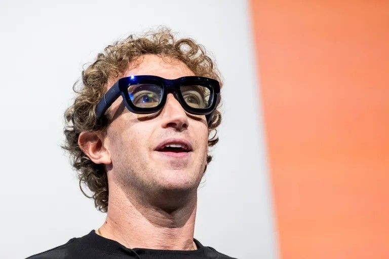 Mark Zuckerberg wearing some majorly clunky looking glasses 