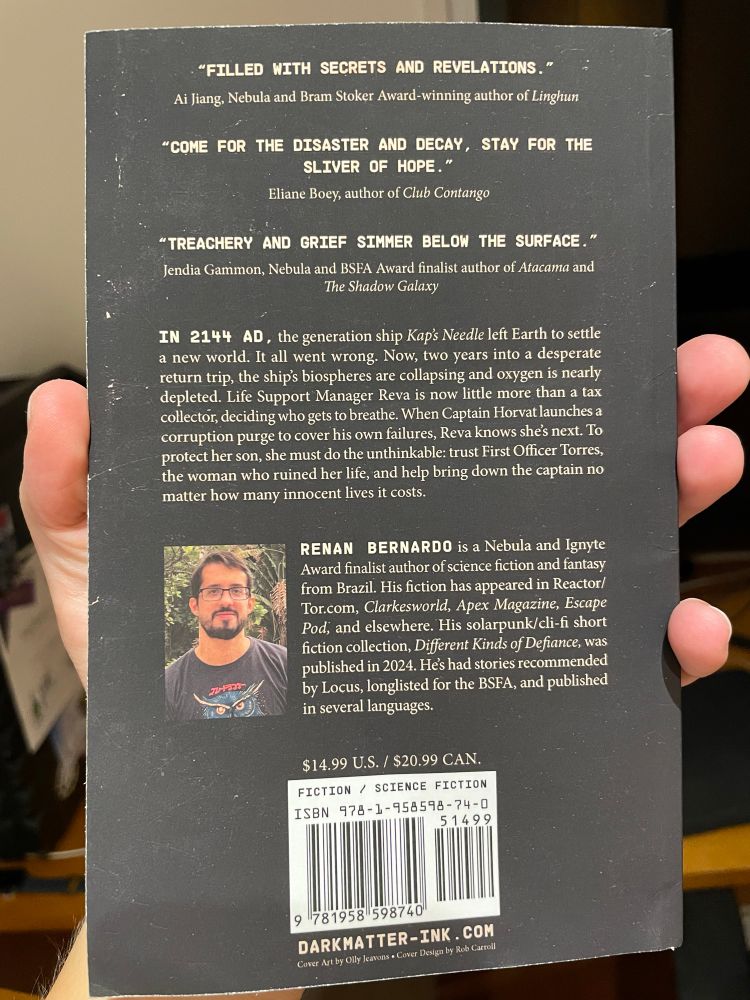 The back cover of the book with a headshot of the author, his bio, the synopsis, and some blurbs.