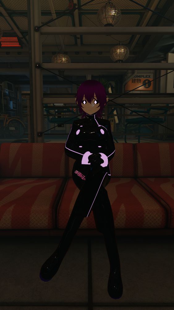 Jaida sitting with legs crossed, wearing a double-breasted jacket with pink accents. The second row of buttons are exaggerated due to how VRoid maps textures