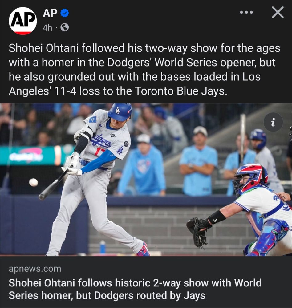 Screen shot of an AP article with the caption "Shohei Ohtani followed his two-way show for the ages with a homer in the Dodgers World Series opener, but he also grounded out with the bases loaded in Los Angeles's 11-4 loss to the Toronto Blue Jays." 