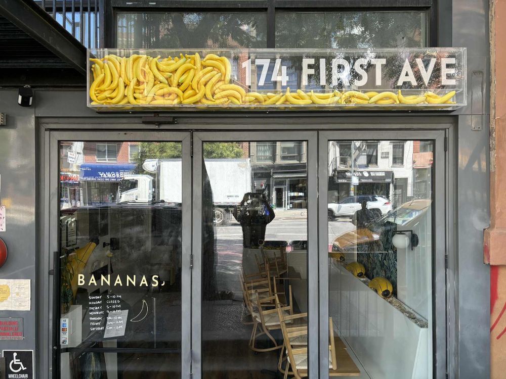 A restaurant in Manhattan on 1st Ave. called, “Bananas.” There is a clear lucite box above the door and running horizontally above the front window, filled with plastic bananas, piled strategically to display the street address, “174 First Avenue.”