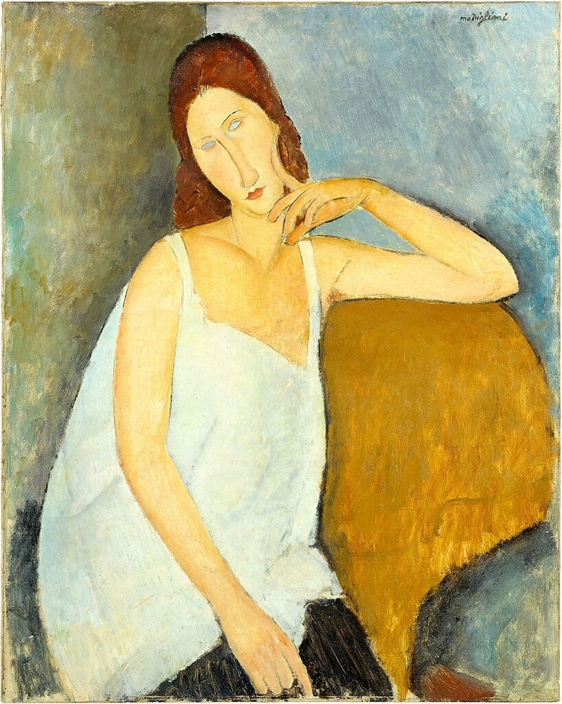 Painting of a woman in a stray white top that conceals her pregnancy. The painting is stylized the way Modigliani typically works. The Eyes are empty light blue ovals. The face is an elongated oval with a long long nose. The planes of color are flat and artificial. She has one arm up on the back of a brown chair with her forefinger lightly touching her face. The chair's burnt umber brown is in the same range as the color of her hair, and more distantly, her skin. That provides real unity to the painting.