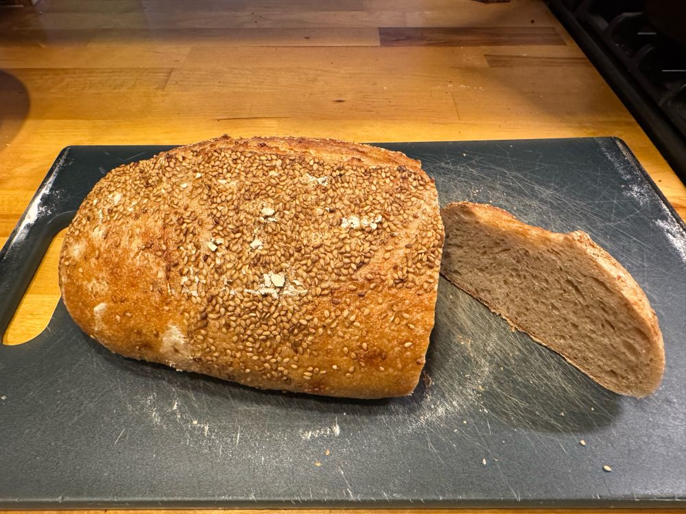 Seeded loaf of sourdough bread.