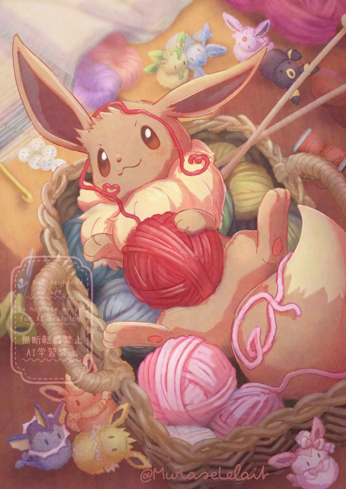 Eevee lying on a basket full of yarn balls