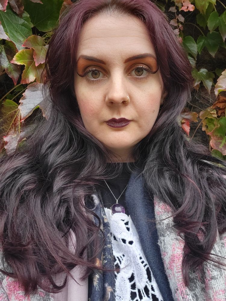 Selfie of weird black purple hair 