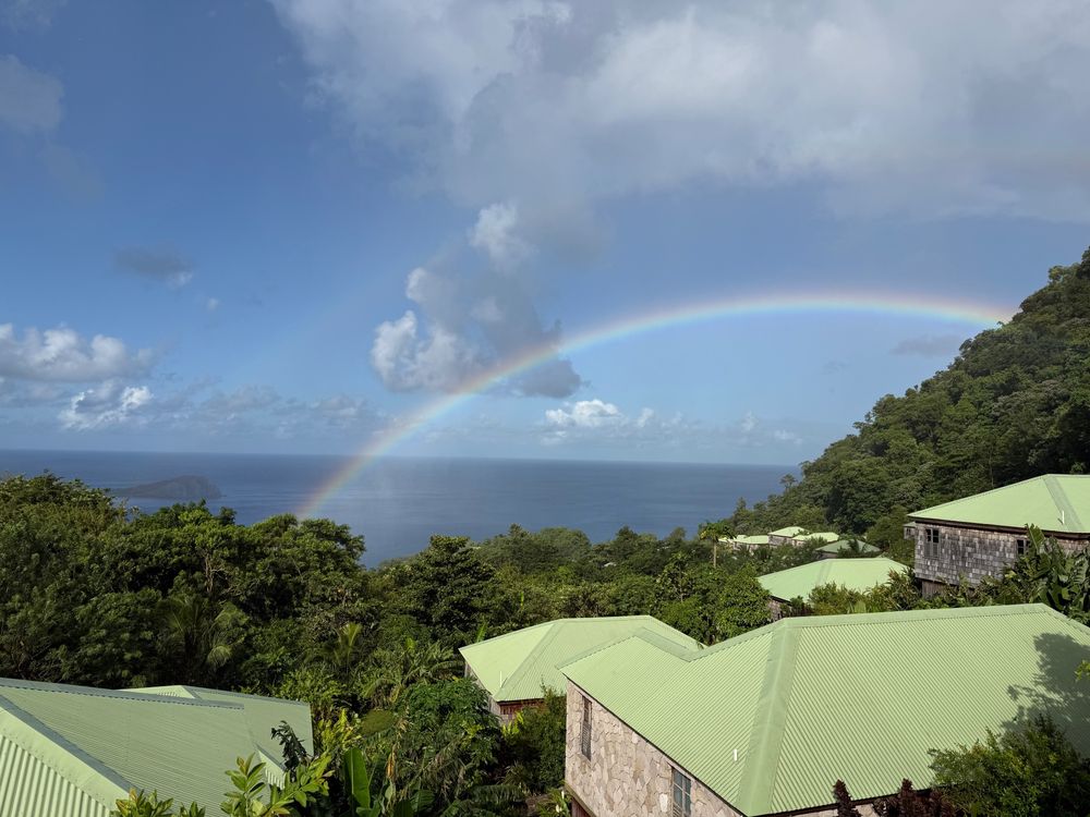 Dawn rainbow over Soufries, Dominica