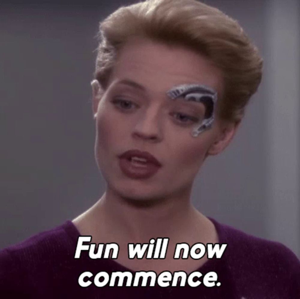 a woman with a robotic eye painted on her face says fun will now commence