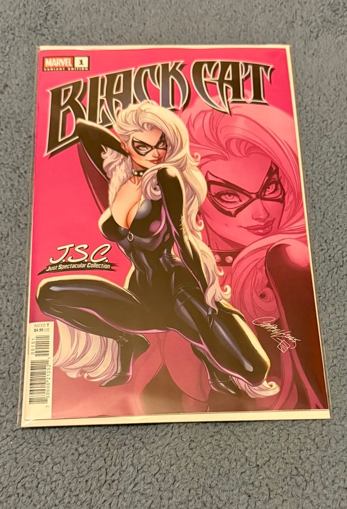 The cover to Black Cat issue 1 showing Black Cat striking a pose on a pink background 