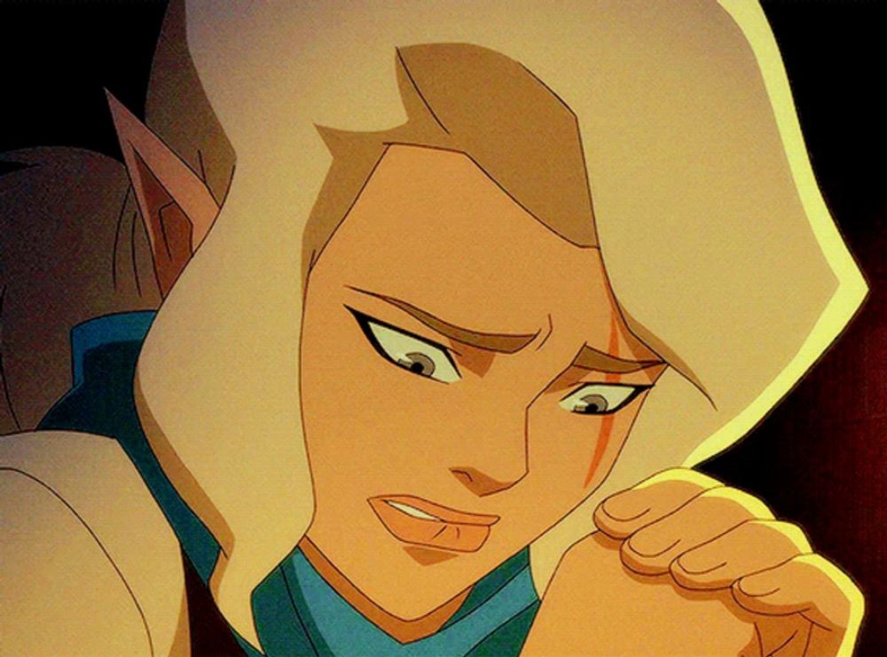 a close up of a cartoon character 's face with a sad look on her face