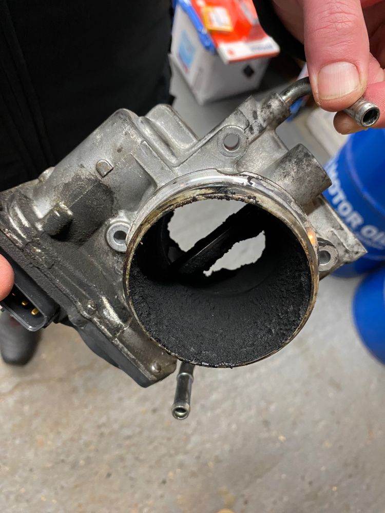 2.2 throttle body with lots of black deposits