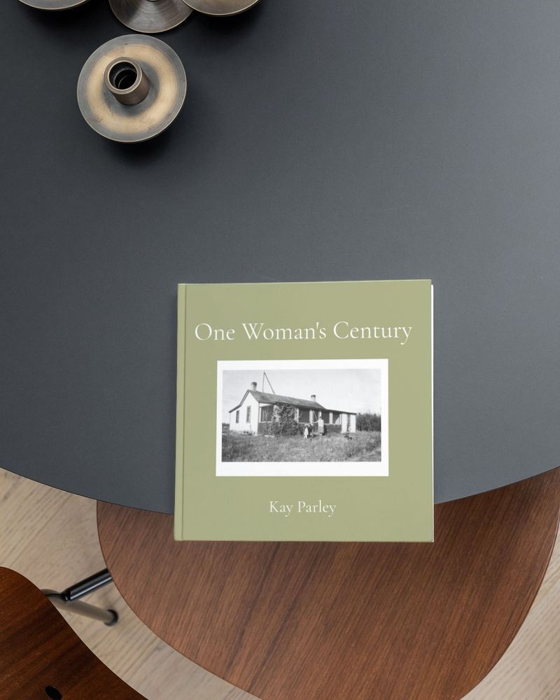 One Woman's Century by Kay Parley. The cover has a black and white photograph of the author's childhood home, taken in 1935.