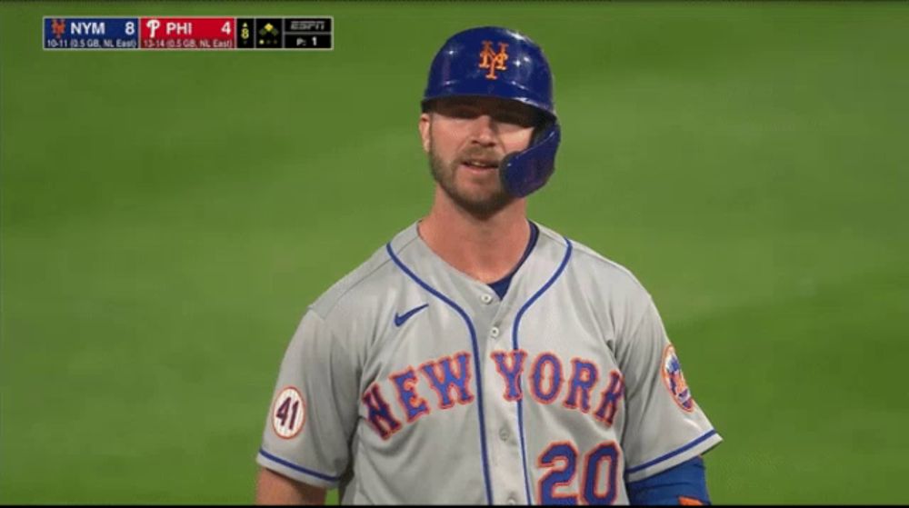 a baseball player for the new york mets is giving the thumbs up