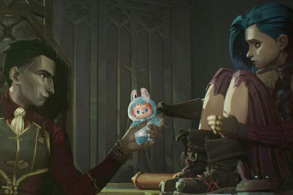A screenshot from arcane with jinx sitting on a table next to hot handsome silco. he's holding a blue labubu in his hand and offering it to her. i took this graphic from twitter.