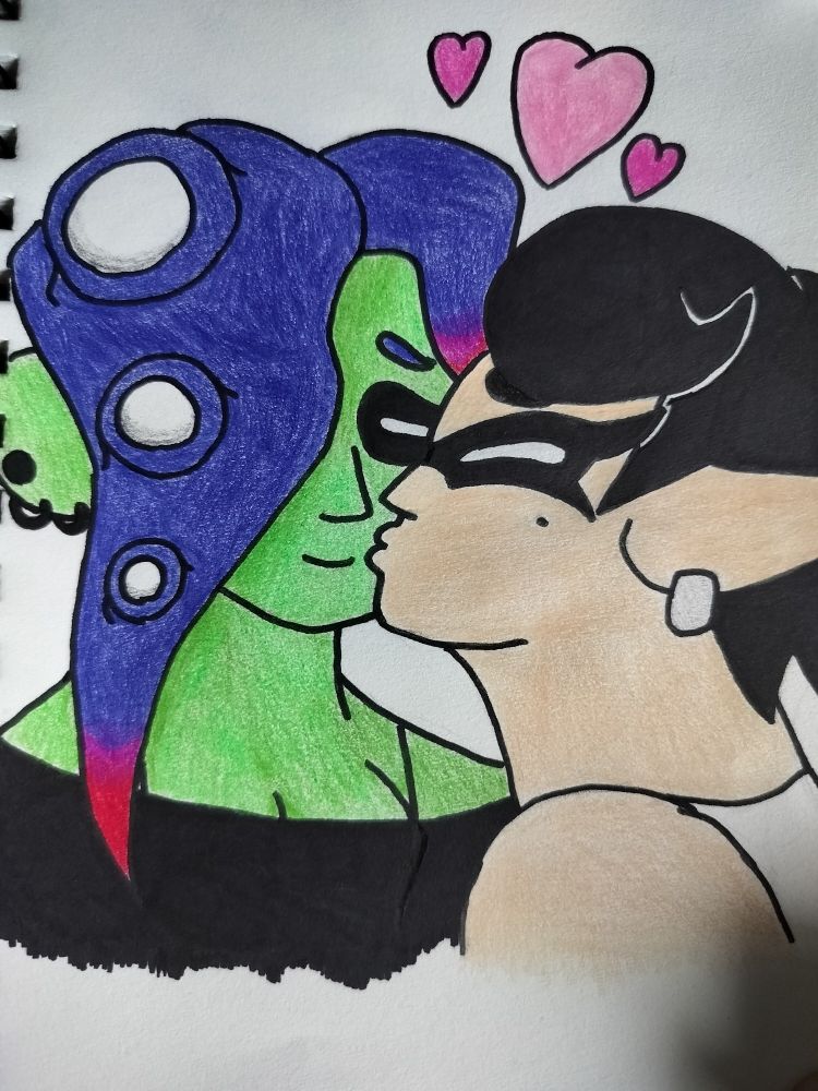 Callie kissing Acht on the cheek 