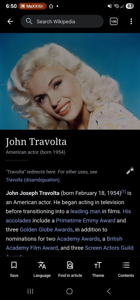 A photo of blonde bombshell Jayne Mansfield, radient and smiling, is the feature image of a Wikipedia article for John Travolta, who definitely looks nothing like Mansfield. 